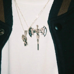 RELIGION IS WAR PENDANT
