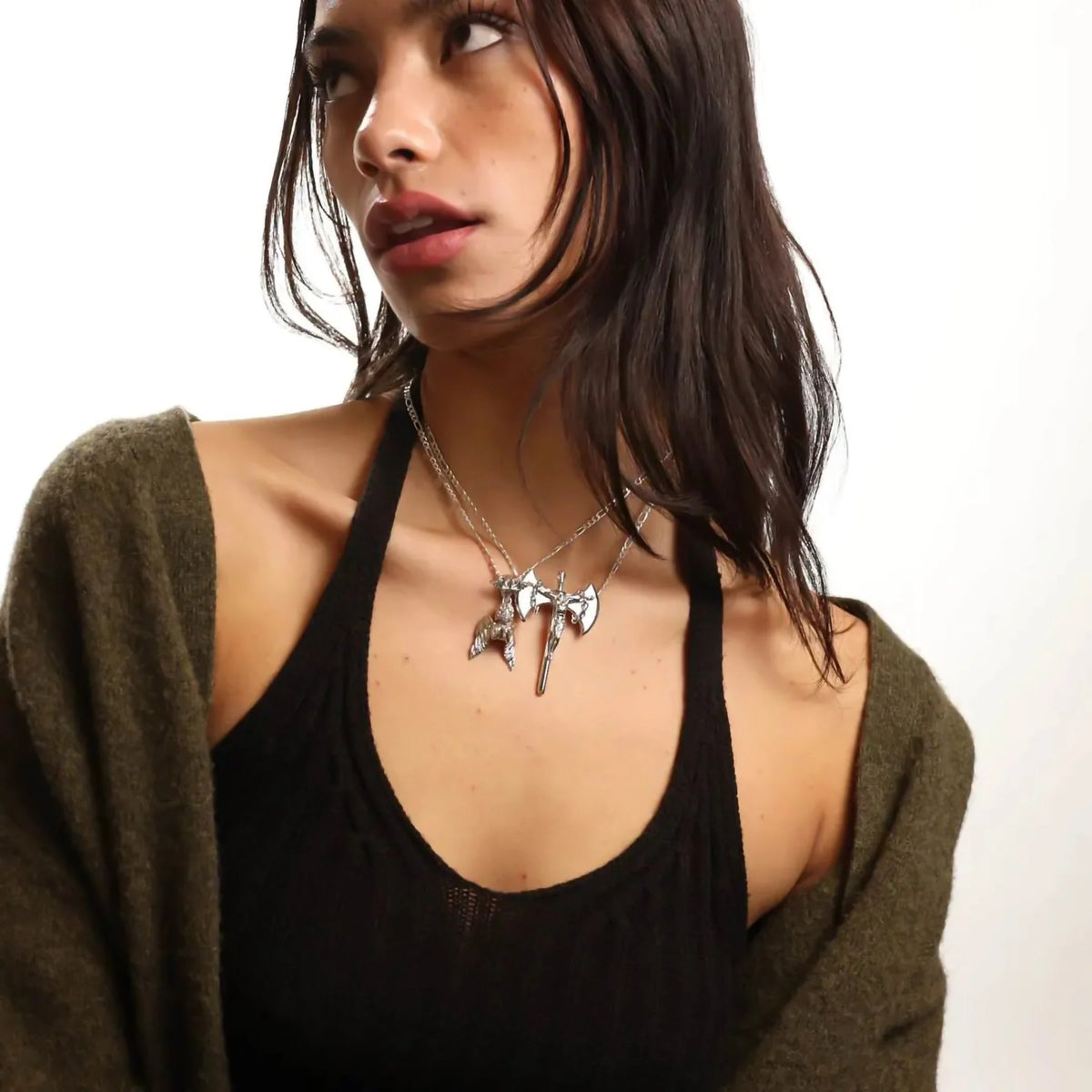 RELIGION IS WAR PENDANT