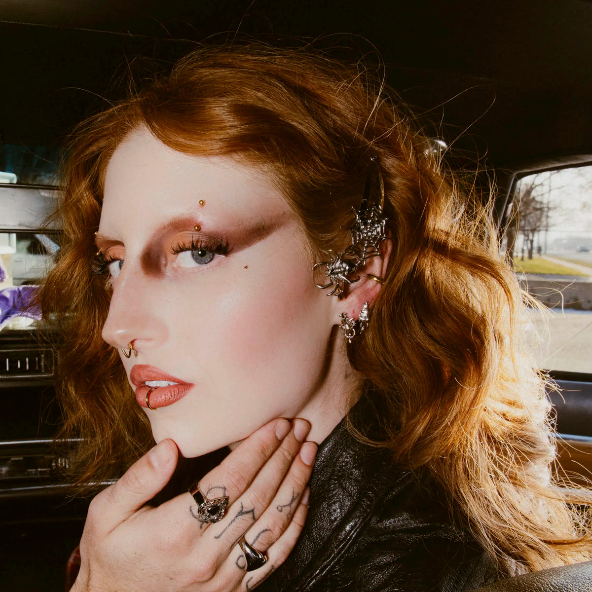 "NOSE" STUD EARRING
