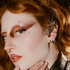 "NOSE" STUD EARRING